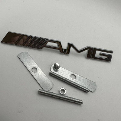 Шильдик на решітку радіатора металевий Mercedes AMG хром  y441 фото