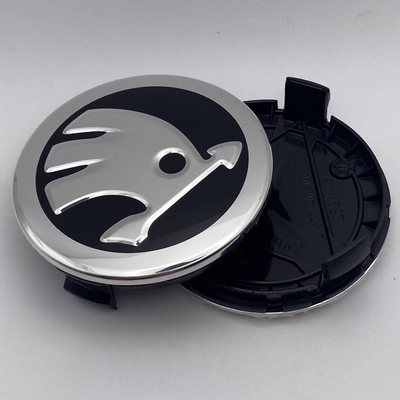 Ковпачки для дисків Skoda 75 мм 70 мм чорні з хром логотипом  b269 фото
